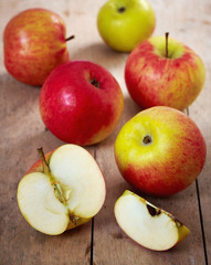 fresh apples on old wooden table
