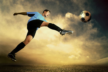 Shoot of football player on the outdoor field