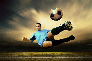 Shoot of football player on the outdoor field
