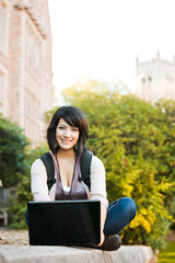 Mixed race college student with laptop