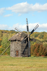 Fototapeta na wymiar Antique wooden windmill, Pirogovo, Kiev, Ukraine