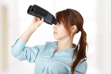 Young business woman with binocular