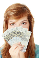 Teen woman with euro money