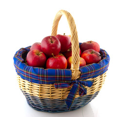 Fototapeta na wymiar Wicked cane basket apples