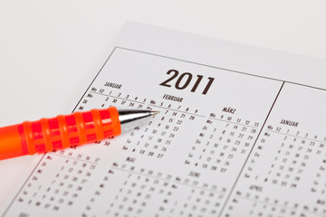 Kalender mit Kugelschreiber