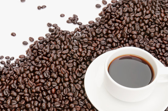 coffee cup on coffee bean background