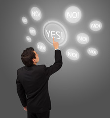 business man pressing touchscreen button