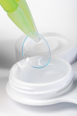 Contact lens in tweezers