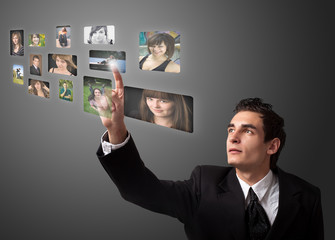 man choosing photos