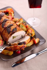 Roast pork with sage and thyme sauteed potatoes and spiced apple