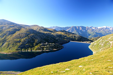 dark alpine mountain lake