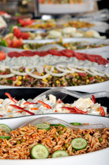 Buffet style food in trays - a series of RESTAURANT images.