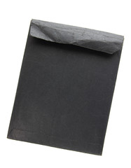 Old black envelope isolated on white