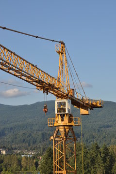 Construction crane with nature background