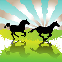 Galloping horses in field