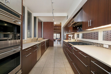 Kitchen with dark wood cabinetry
