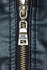 Zip on leather coat with words 'Made in China'