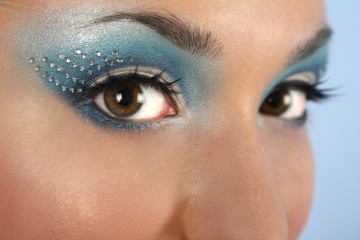 Obraz premium female eyes with blue make-up