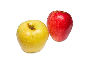 Ripe yellow and red apples on white