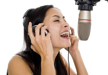 beautiful woman singing in studio