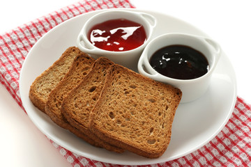 toasts with jam in small bowls