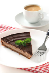 chocolate cake with a cup of coffee