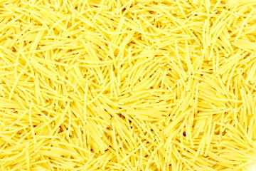Macaroni products vermicelli as a background.