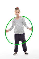 Sporty llittle girl with hula hoop © Lena Volkova
