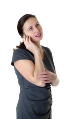Fototapeta premium The woman speaks by phone