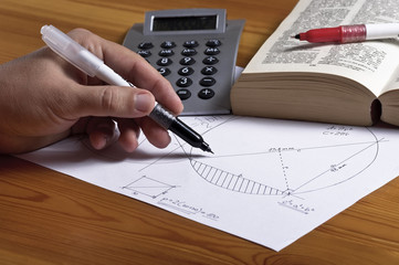 Left handed man drawing geometry