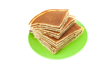 Pancakes on a plate isolated on white