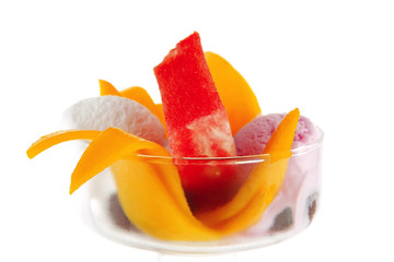 small cup with fruits and ice cream