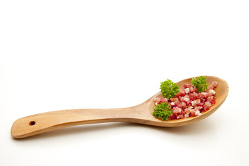 Speck auf Holzlöffel