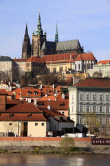 Obraz premium View on the autumn Prague gothic Castle above River Vltava