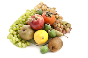 A lot of ripe fruit on a glass plate