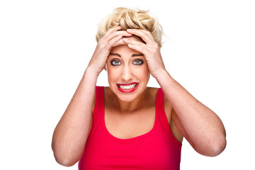 Stress, Worry and Frustration - woman holding hands to head