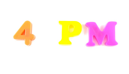 4 pm written in fridge magnets on white background