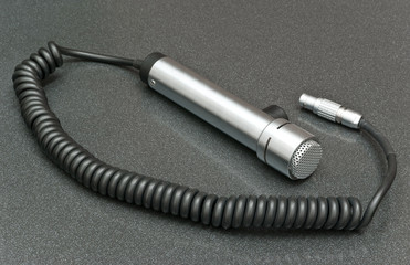 Microphone on gray background