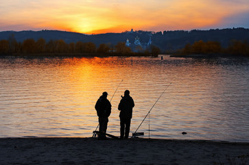 Fishermans on sunset