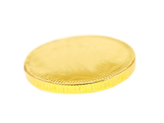 gold chocolate coin isolated on white background