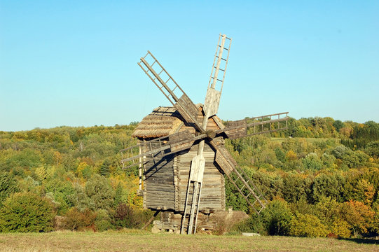 Antique ramshackle wooden windmill, Pirogovo, Kiev, Ukraine