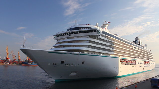 White liner arriving at sea port from cruise