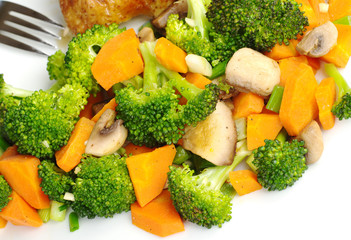 Fried vegetables with fork