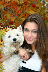 portrait of beautiful girl with her dog