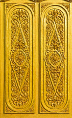 Cement sculpture of Thai art design on the temple's wall