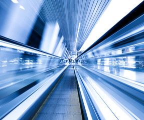 abstract vanishing corridor inside escalator way