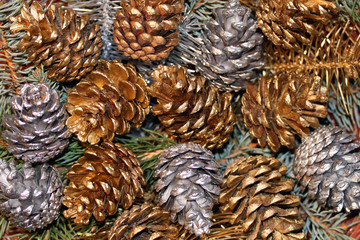 Silver and golden pine cone.