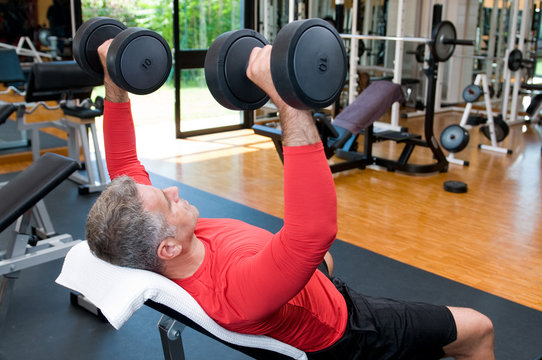 Mature Man Lifting Weights