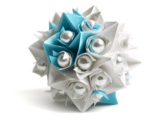 white and blue paper origami ball with pearl, decor element, iso