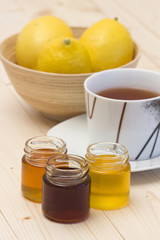 cup of lemon tea and honey